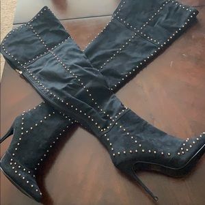Above the knee high heel boots
